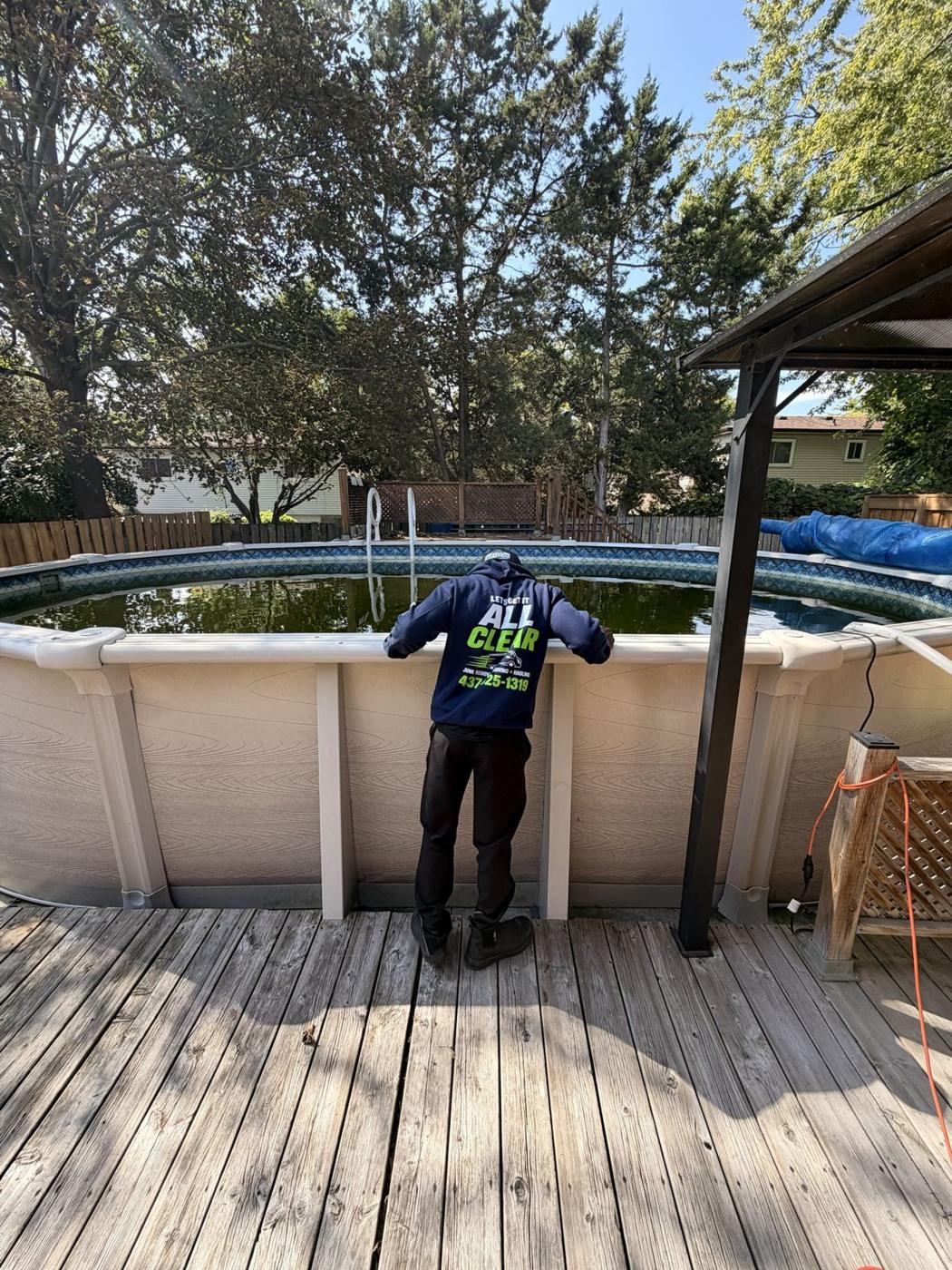 All Clear crew sizing up a pool removal